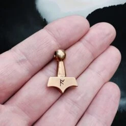 Small Knotwork Thors Hammer Pendant 9 Small Knotwork Thors Hammer Pendant -The Viking Dragon Shop ad bronze small knotwork thors hammer pendant on hand back view