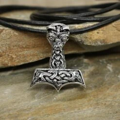 Large And Ferocious Thors Hammer Pendant -The Viking Dragon Shop ad silver large ferocious thors hammer with thong on rock