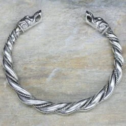 Twisted Silver Arm Ring / Bracelet With Gotlandic Dragon Heads -The Viking Dragon Shop bt 8mm silver twisted armring gotland dragon heads on rock
