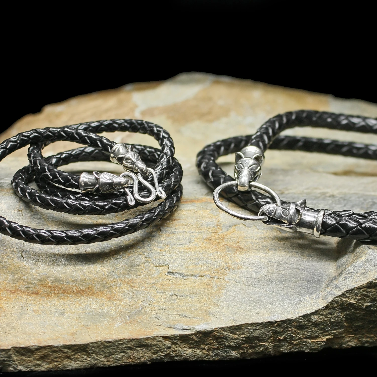 Braided Leather Necklace With Silver Icelandic Wolf Heads 1 Braided Leather Necklace With Silver Icelandic Wolf Heads