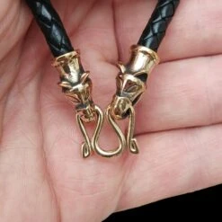 Braided Leather Necklace With Bronze Icelandic Wolf Heads -The Viking Dragon Shop bt bronze 5mm braided leather necklace icelandic wolf heads split ring in hand