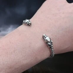 Twisted Silver Viking Bracelet With Ferocious Wolf Heads 10 Twisted Silver Viking Bracelet With Ferocious Wolf Heads -The Viking Dragon Shop bt silver twisted bracelet ferocious wolf heads on wrist