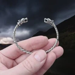 Slim Twisted Silver Viking Bracelet With Ferocious Wolf Heads