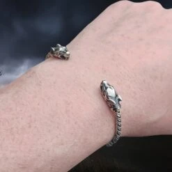 Slim Twisted Silver Viking Bracelet With Ferocious Wolf Heads -The Viking Dragon Shop bt silver twisted bracelet ferocious wolf heads slim on wrist
