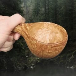 Handmade Kuksa Birch Wood Cup -The Viking Dragon Shop ca birch curl kuksa cup in hand angle view