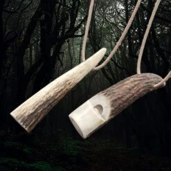 Scottish Red Deer Handmade Antler Whistle 10 Scottish Red Deer Handmade Antler Whistle -The Viking Dragon Shop ch antler whistles on natural leather thongs angle view