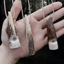 Scottish Red Deer Handmade Antler Whistle 11 Scottish Red Deer Handmade Antler Whistle -The Viking Dragon Shop ch antler whistles on natural leather thongs different sides on hand