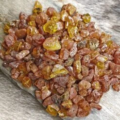 Amber Chips With Drilled Holes 9 Amber Chips With Drilled Holes -The Viking Dragon Shop eg raw amber chips with drilled holes 100g