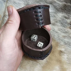 Meier Viking Dice Game -The Viking Dragon Shop kr handmade leather meier shaker in hand with dice inside