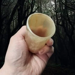 Horn Dice Cup / Shot Cup -The Viking Dragon Shop nc horn dice cup wooden base in hand light colour inside view