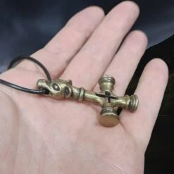 Large Brass Wolf Cross Thors Hammer Pendant -The Viking Dragon Shop pc brass large wolf cross hammer on hand side view