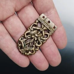 The Viking Dragon Shop -The Viking Dragon Shop pc bronze saxon winchester strap end with dragon design on hand