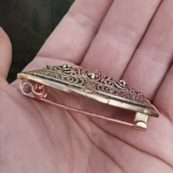 Bronze Borre Style Openwork Viking Tortoise Brooches 10 Bronze Borre Style Openwork Viking Tortoise Brooches -The Viking Dragon Shop pp bronze borre style viking tortoise brooch on hand side view