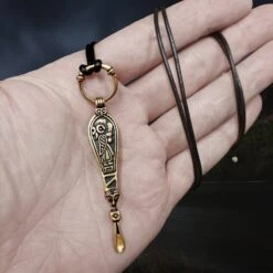 Bronze Ear Spoon Viking Pendant With Ring Hanger -The Viking Dragon Shop pp bronze earspoon pendant on hand on leather thong valkyrie side