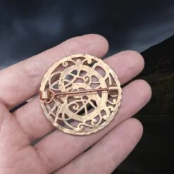 Large Bronze Saxon Pitney Brooch -The Viking Dragon Shop pp bronze round pitney brooch on hand back view