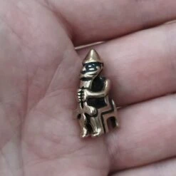 Bronze Seated Thor Pendant -The Viking Dragon Shop pp bronze thor seated pendant in hand side angle view