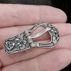The Viking Dragon Shop -The Viking Dragon Shop pp silver plated borre style belt buckle from birka on hand angle view