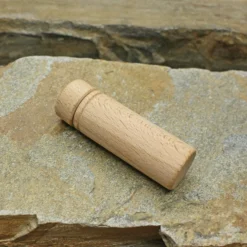Wooden Viking / Medieval Needlecase -The Viking Dragon Shop qs small wooden needle case on rock side
