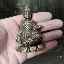 Viking Age Bronze Buddha Statuette Replica From Helgö -The Viking Dragon Shop sg bronze age buddha statuette on hand