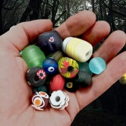 Assorted Handmade Glass Viking Beads From Birka -The Viking Dragon Shop sg glass beads from birka selection in hand