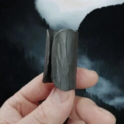 Iron Candle Holder -The Viking Dragon Shop sg iron candle holder in fingers