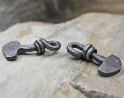 Iron Viking Thors Hammer Pendant From Birka -The Viking Dragon Shop sg iron thors hammers from birka on rock side view