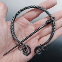Large Decorated Iron Cloak Pin From Birka -The Viking Dragon Shop sg large iron decorated cloak pin from birka pinned on hand