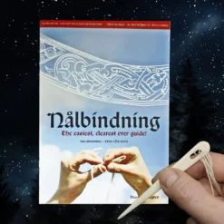 Nalbinding Instruction Book -The Viking Dragon Shop sg nalbinding book with needle strayy sky yule background