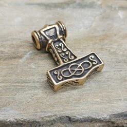 Large Bronze Thors Thunder Hammer Pendant -The Viking Dragon Shop sn bronze large thunder hammer on rock back angle view