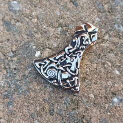 Bronze Mammen Axe Head Pendant -The Viking Dragon Shop sn bronze mammen axe head pendant on stone