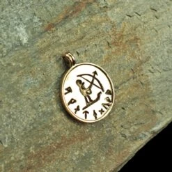 Bronze Skadi Ull Viking Pendant -The Viking Dragon Shop sn bronze skadi ull pendant on rock