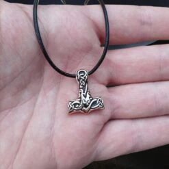Small Bronze Interlace Thors Hammer Pendant -The Viking Dragon Shop sn bronze small interlace thors hammer pendant on leather thong on hand