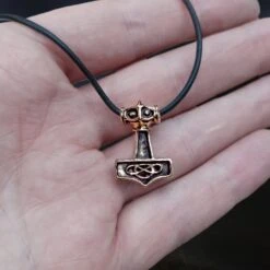 Small Bronze Thunder Thors Hammer Pendant -The Viking Dragon Shop sn bronze small thunder hammer viking pendant on leather thong on hand