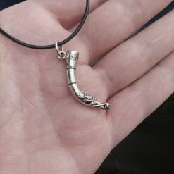 Silver Viking Drinking Horn Pendant -The Viking Dragon Shop sn silver drinking horn pendant on leather thong on hand