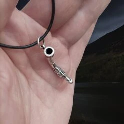 Silver Viking Drinking Horn Pendant -The Viking Dragon Shop sn silver drinking horn pendant on leather thong on hand above angle view