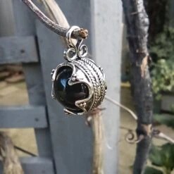 Small Silver Gotland Onyx Ball Pendant -The Viking Dragon Shop sn silver gotland onyx ball pendant in tree angle view