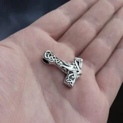Medium Silver Interlace Thors Hammer Pendant -The Viking Dragon Shop sn silver medium interlace thors hammer pendant on hand side angle view