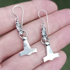 Silver Gotland Dragon Thors Hammer Earrings -The Viking Dragon Shop sn silver thors hammer gotland dragon earrings on hand angled