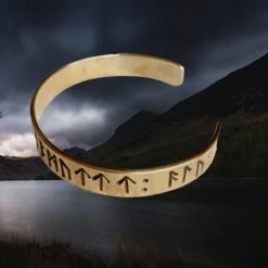 Brass Runic Bracelet From Lindholm -The Viking Dragon Shop tc brass dark age runic bracelet from lindholm side angle view