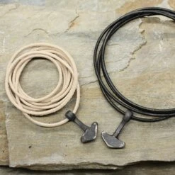 Hand Forged Iron Replica Thors Hammer Pendant -The Viking Dragon Shop th iron thors hammers on thongs on rock