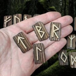 Elder Futhark Wooden Rune Set In Leather Pouch -The Viking Dragon Shop wl wooden elder futhark runes on hand and below